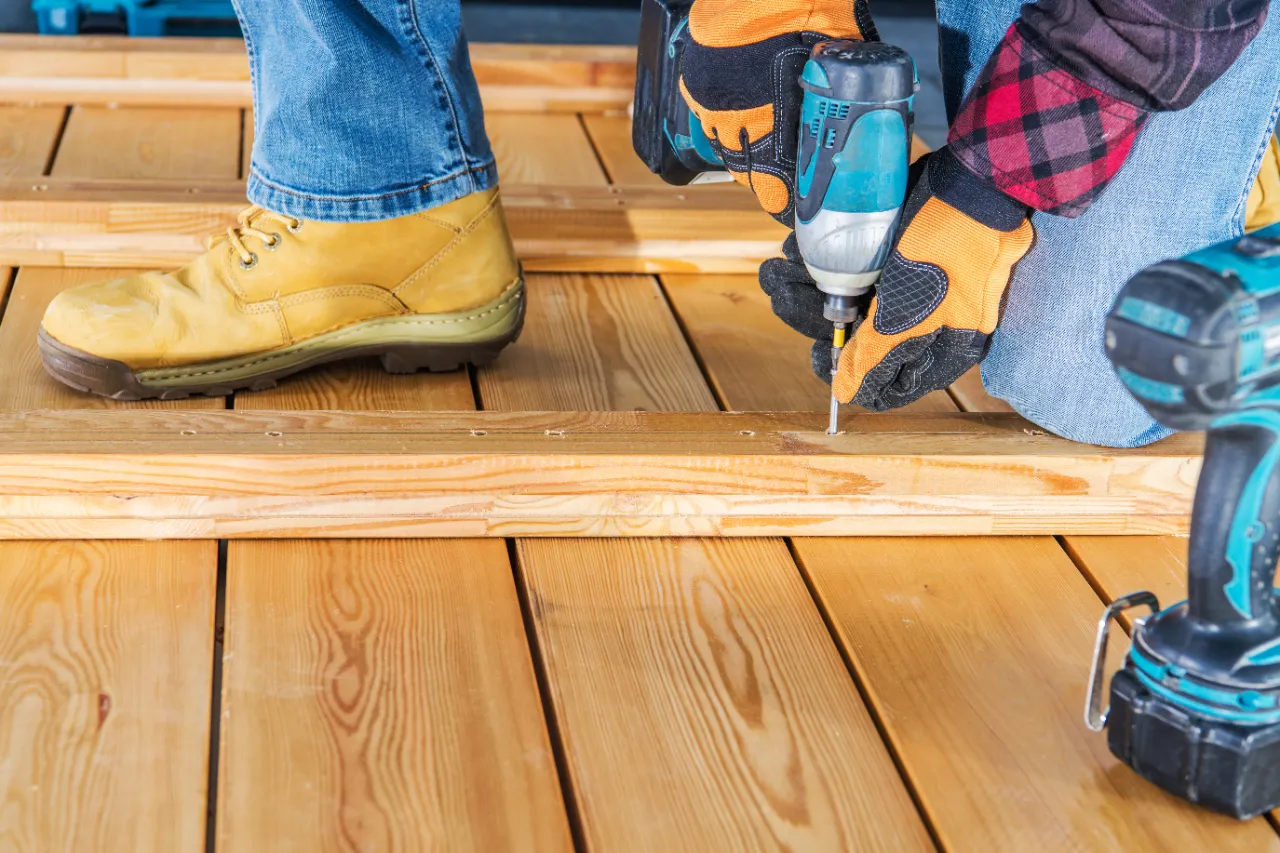 Worker building a backyard deck in New Jersey