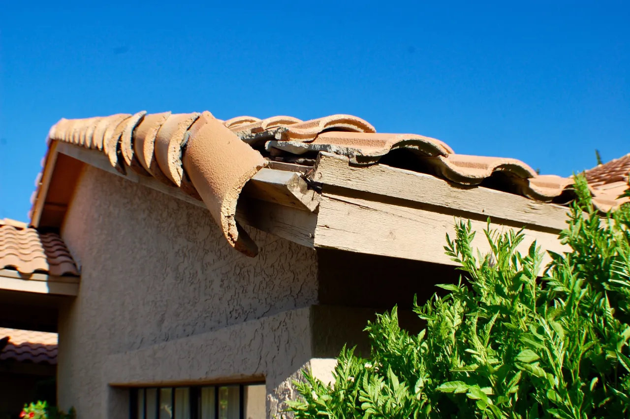 Damaged roof tiles showing signs of wear in New Jersey